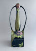 Kapitale vaas van Plateelbakkerij Zuid-Holland uit Gouda, model 5015 van 45 cm hoog met 'groen' Gouda decor, beschilderd door Willem Muller in de periode 1902-1906.